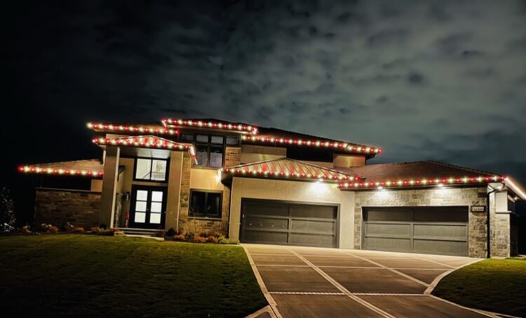 Red and green C9 LED Christmas lights on modern luxury home — Reign Enterprises