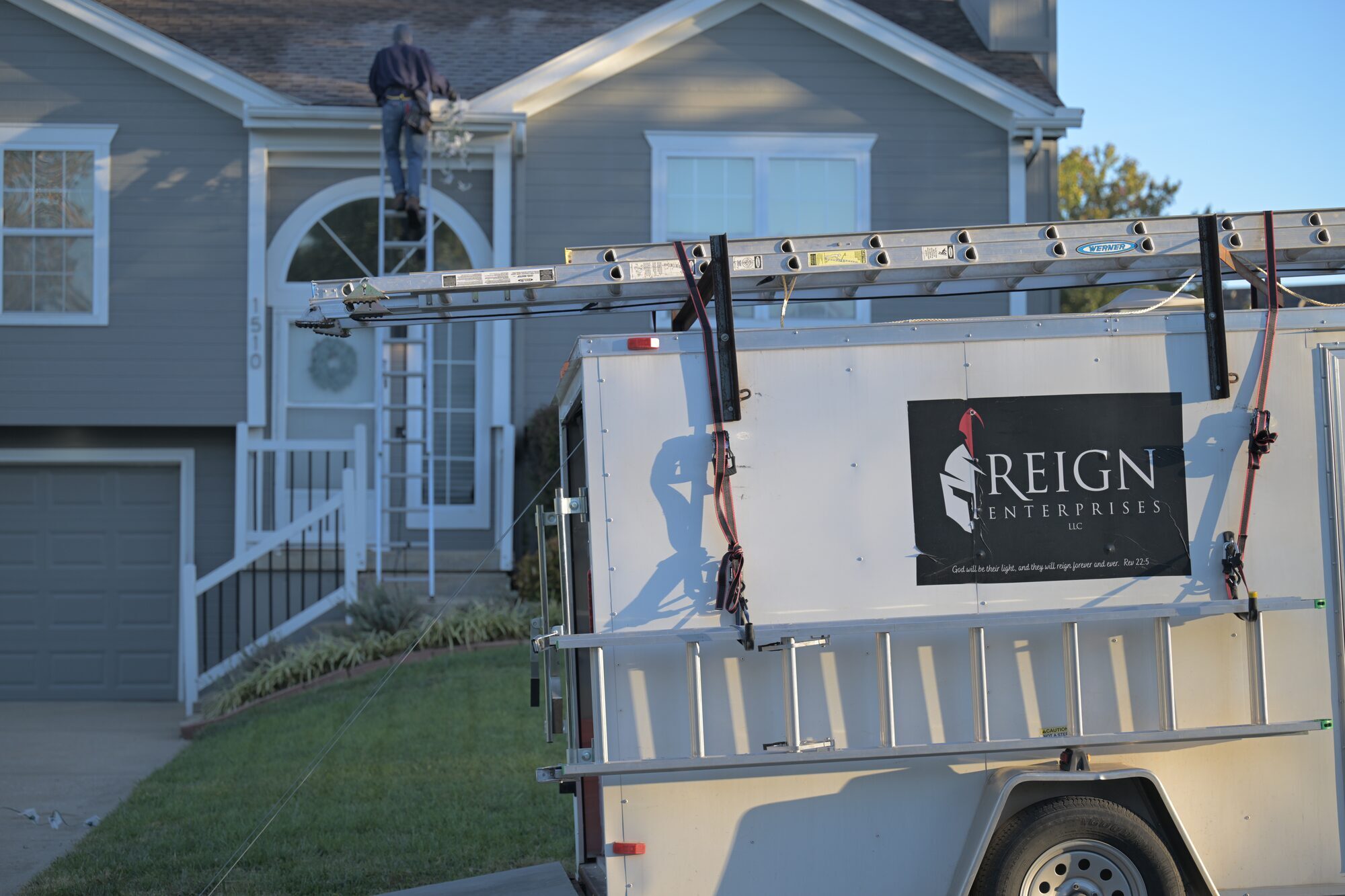 Reign Enterprises branded work trailer on-site